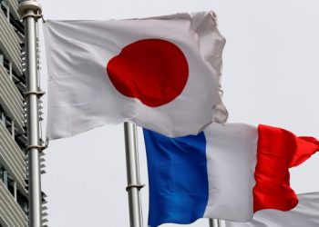 FILE PHOTO: Flags of Japan, France and Nissan are seen at Nissan Motor Co.'s global headquarters in Yokohama, Japan, February 14, 2019. REUTERS/Kim Kyung-hoon/