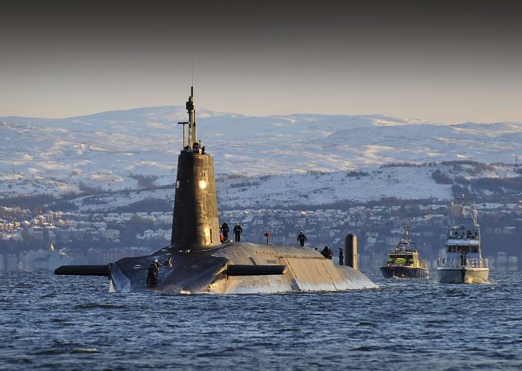 Nuclear submarine HMS Vanguard arrives back at HM Naval Base Clyde, Faslane, Scotland following a patrol.