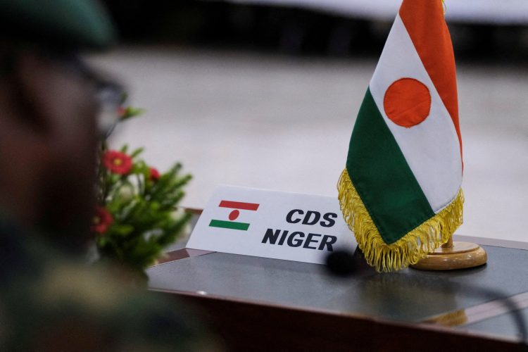 FILE PHOTO: A name tag for Niger's Chief of Defense staff is seen at the ECOWAS meeting on the deployment of its standby force in the Republic of Niger, in Accra, Ghana. August 17, 2023. REUTERS/Francis Kokoroko/File Photo