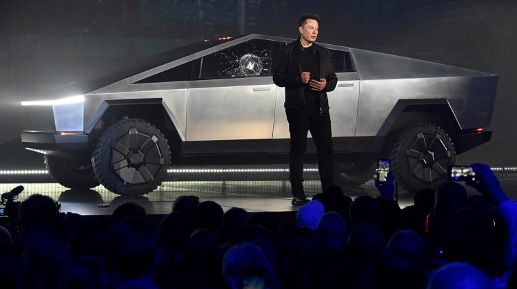 Nov 21, 2019;  Hawthorne, CA, U.S.A; Tesla CEO Elon Musk unveils the Cybertruck at the TeslaDesign Studio in Hawthorne, Calif. The cracked window glass occurred during a demonstration on the strength of the glass.Mandatory Credit: Robert Hanashiro-USA TODAY - RC2FGD97I3Z8