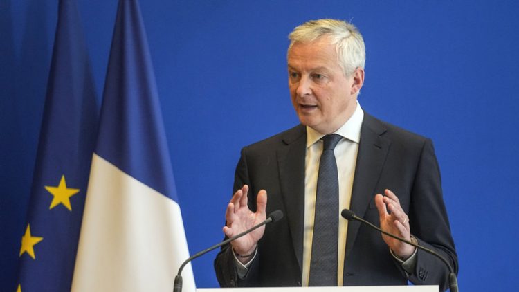 French Finance Minister Bruno Le Maire gestures as he speaks during a media conference after a meeting in Paris, Monday, Feb. 7, 2022. (AP Photo/Michel Euler)